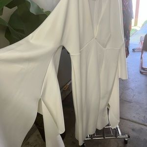 White exaggerated sleeve dress.